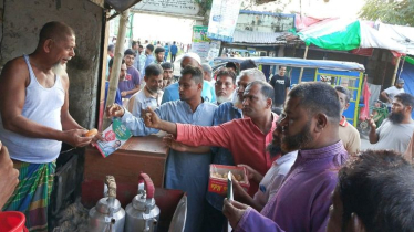 মাসুদুজ্জামানের পক্ষে ৩১ দফা বাস্তবায়নে লিফলেট ও মিষ্টি বিতরণ