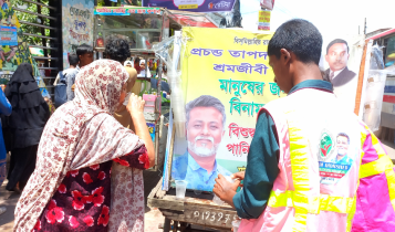 তাপদাহে শ্রমজীবী ও নগরবাসীর মাঝে খোরশেদের শীতল পানি বিতরণ