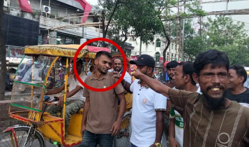 চাষাঢ়ায় বরখাস্ত পুলিশ সদস্যকে আটকে মারধর
